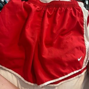 Red Nike dri-fit shorts